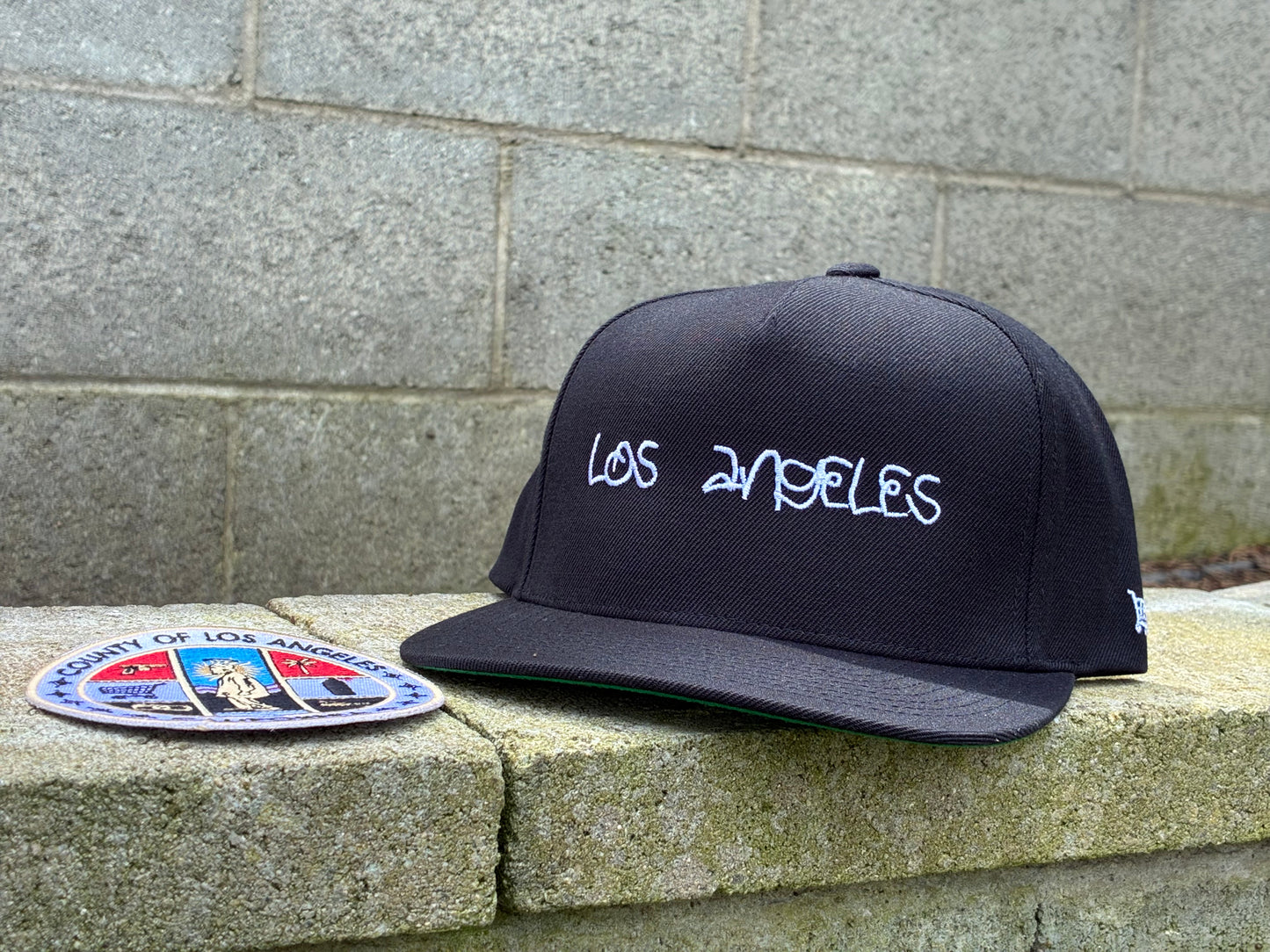 LA REP- SnapBack + BASKETS County Seal
